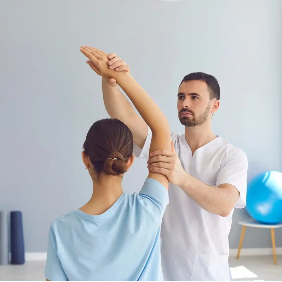 Physiotherapist providing manual therapy at Vedara Care JVC clinic Dubai